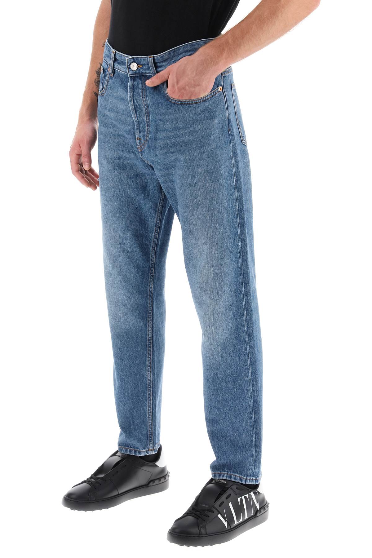 Valentino Garavani tapered jeans with medium wash - VivaceVenus