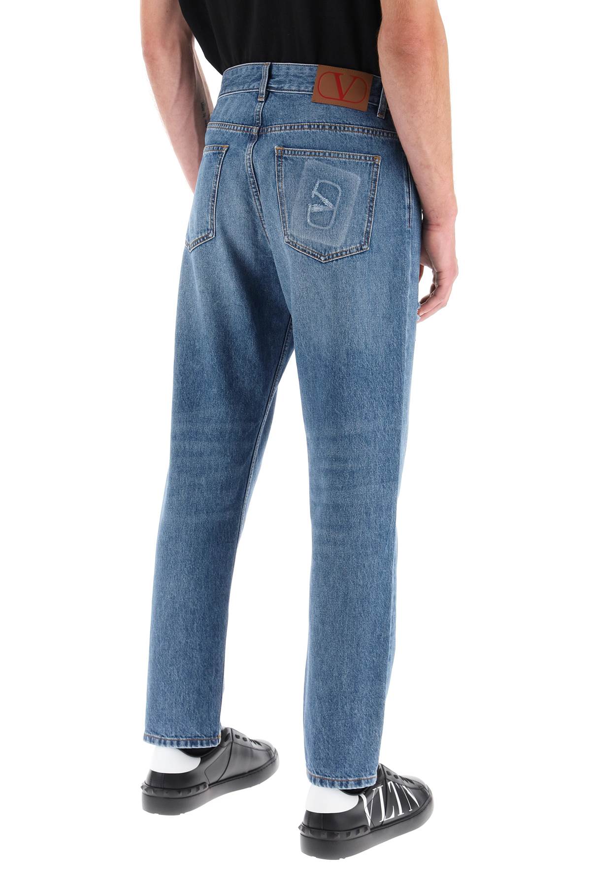 Valentino Garavani tapered jeans with medium wash - VivaceVenus