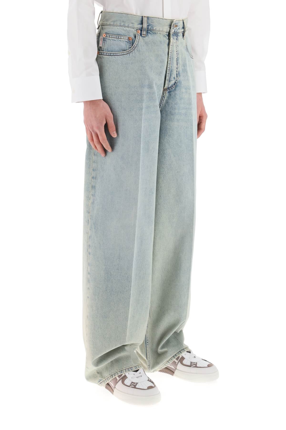 Valentino Garavani oversized jeans with v detail - VivaceVenus