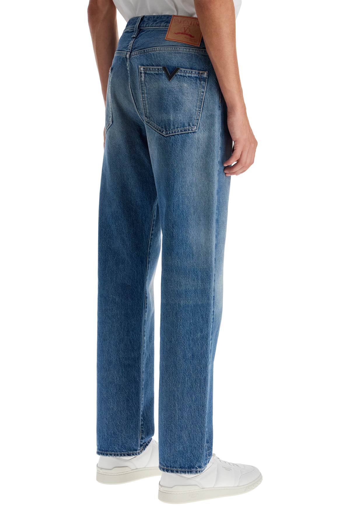 Valentino Garavani jeans with metallic v detail - VivaceVenus